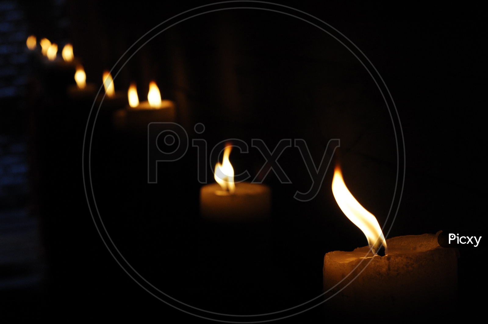 Candle lights in a dark background