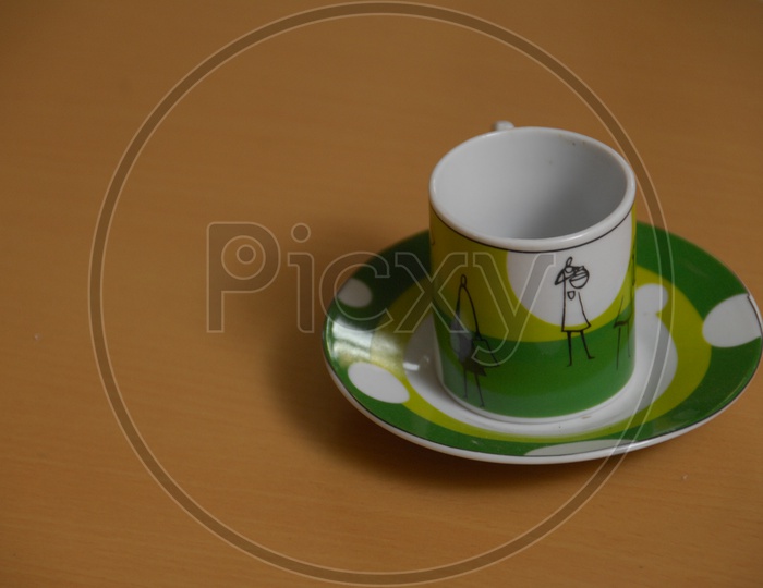 Coffee / Tea Cup With Saucer on a Table