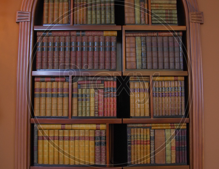 Wooden book shelf with books
