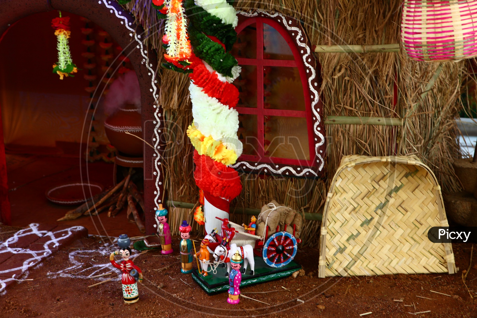 Handcrafted figurines alongside the hut