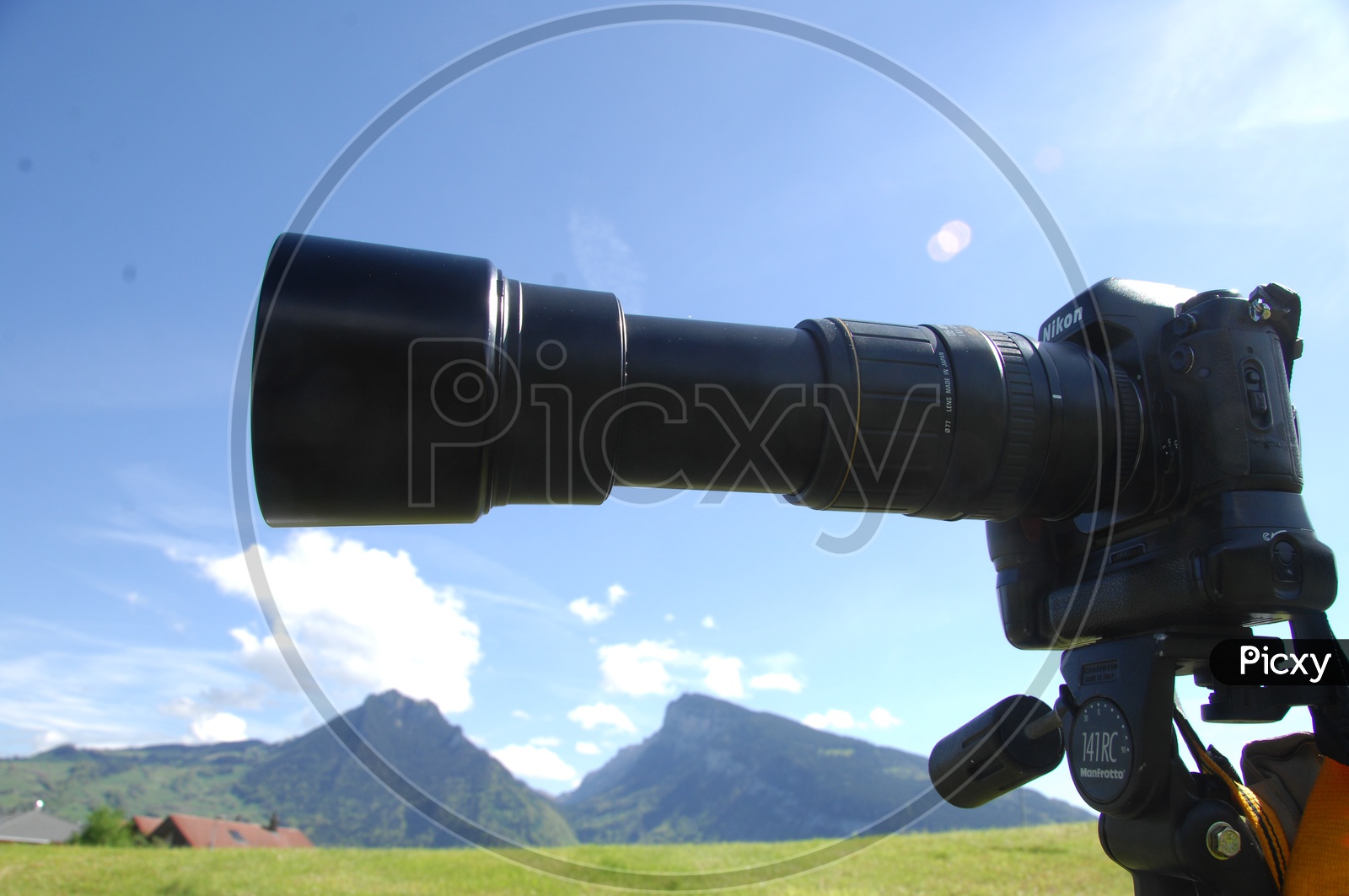A Telephoto Lens Mounted to a DSLR Camera