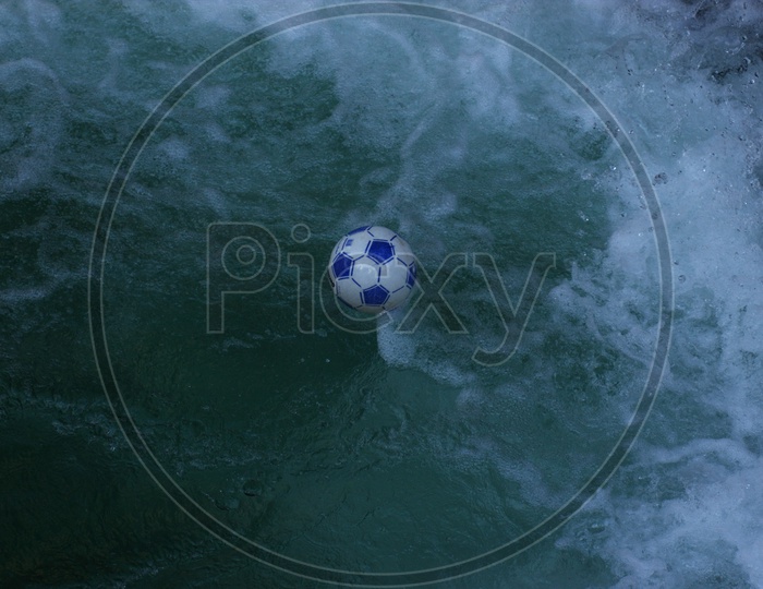 Football in water