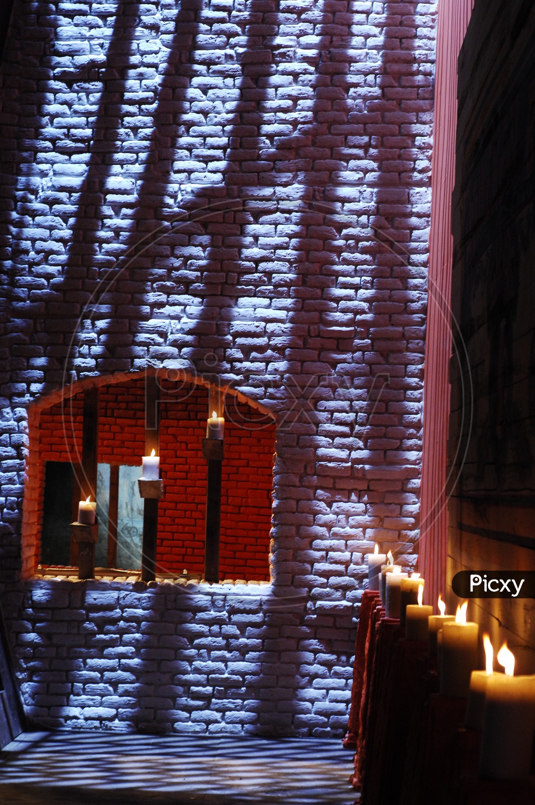 Image of Lite wax candle in a closed roomSI432542Picxy