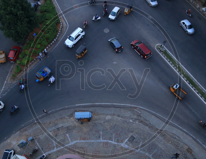 Aerial View Of Traffic Signal Y Junction With Vehicles On Road