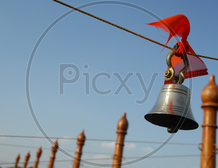 Hanging bell tied to a rope