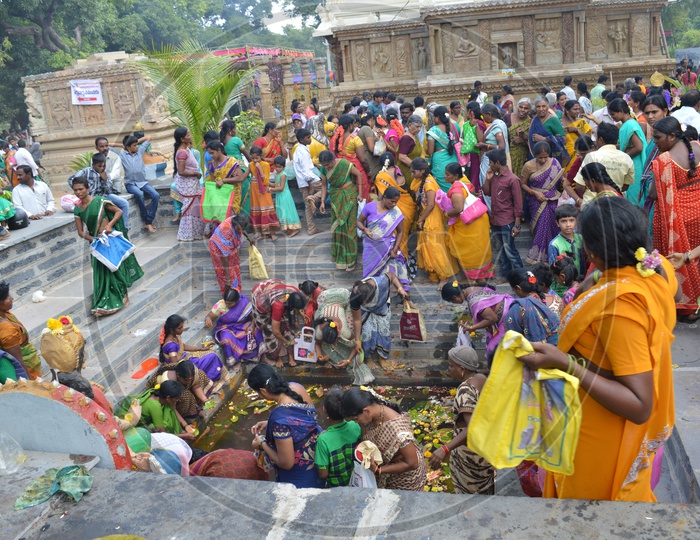Women Performing pooja to Goddess Bala tripura sundari at Kanya Theertam