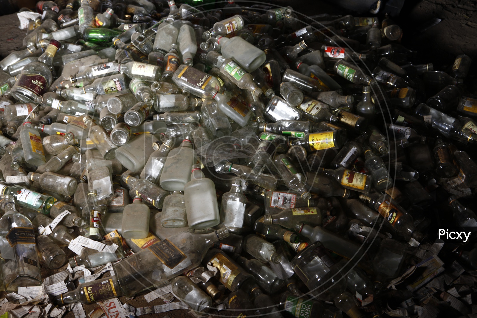 Empty liquor Bottles Piled up in a Place