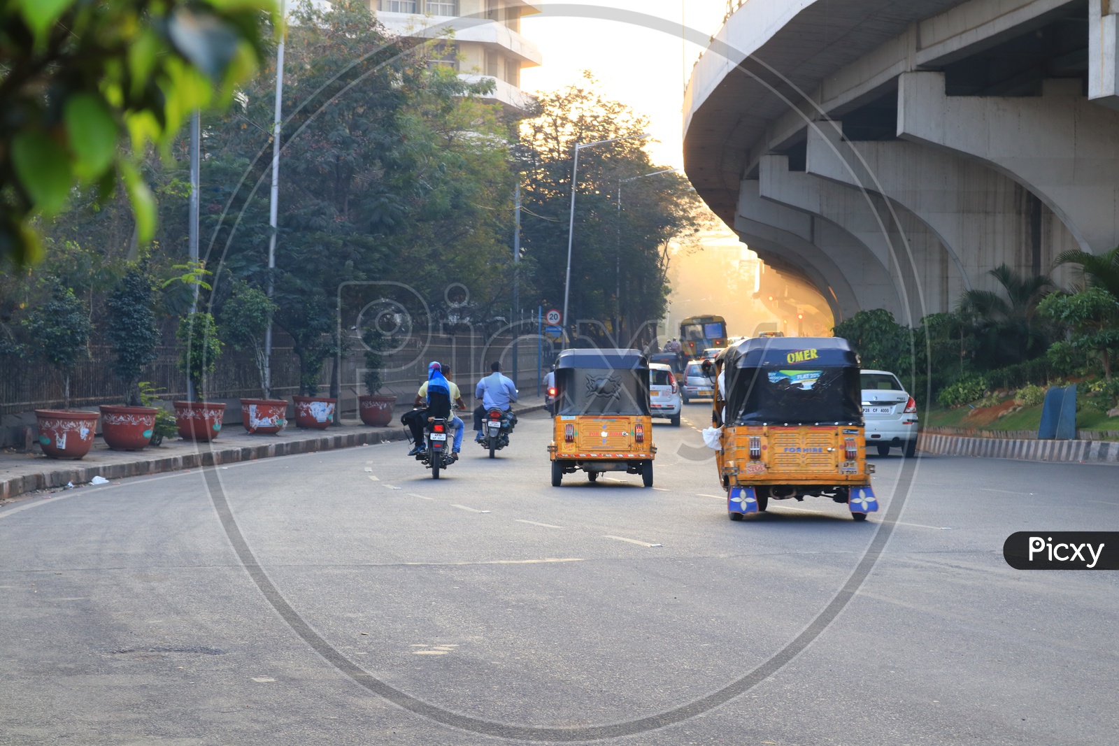 Moving vehicles on a main road in metro city, Hyderabad