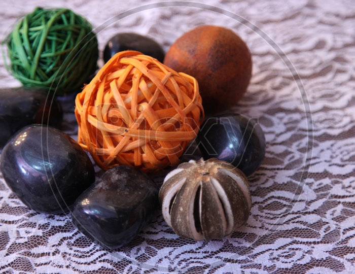 Group of handcrafted specimens along with the plastic fibre ball