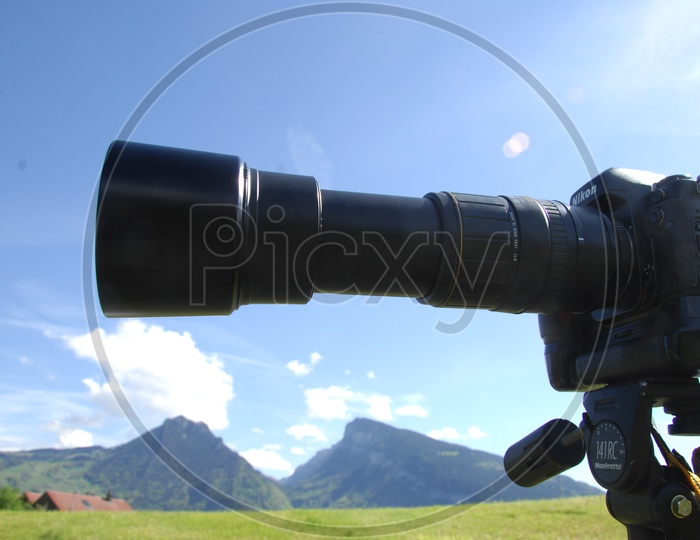 A Telephoto Lens Mounted to a DSLR Camera