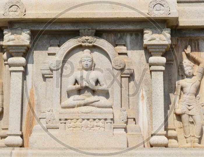 Buddha Sculptures On a Wall