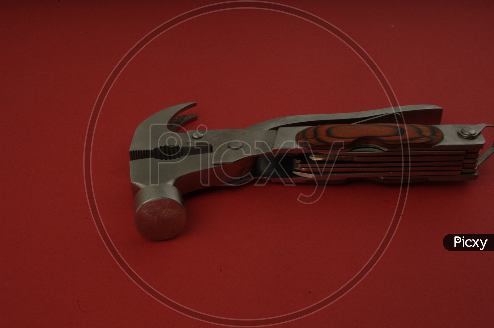 Image of Multitool Plier With Hammer , Axe , Bottle Opener etc