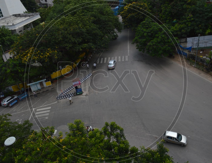 Aerial view of a traffic police controlling the traffic at a Junction