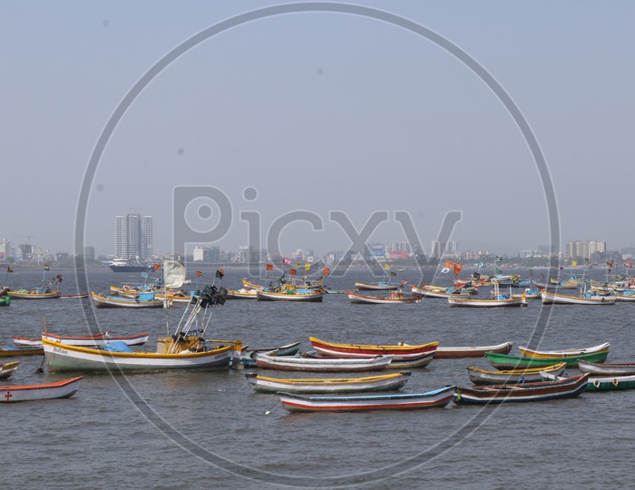 small boats sailing in Arabian sea in Mumbai