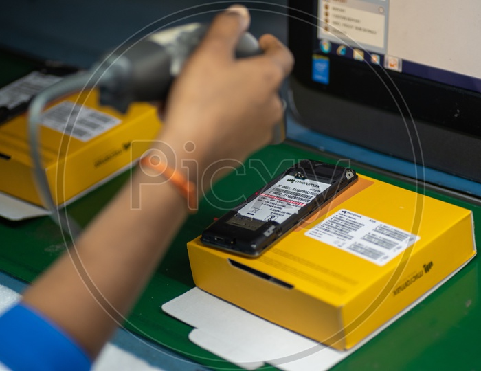 Feature Phone IMEI and Serial Number Barcode Generation In a Mobile Manufacturing Unit