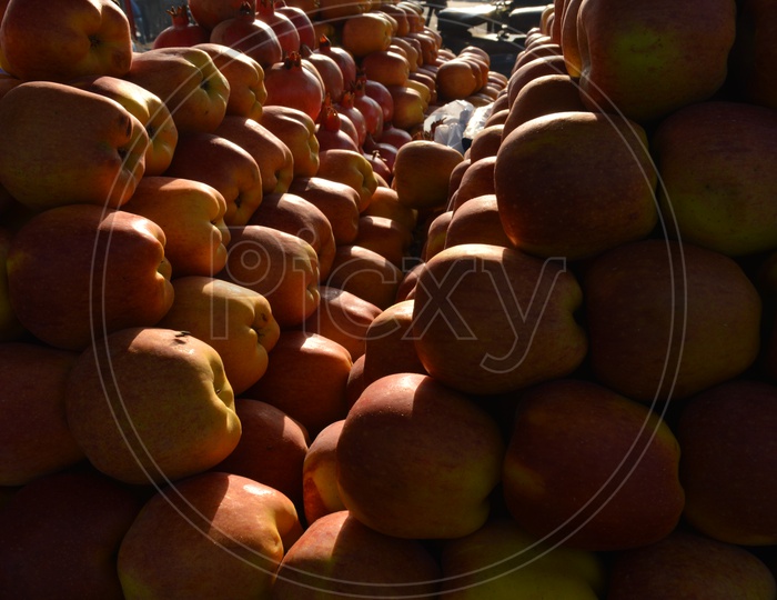 Apples Arranged in a manner in a Vendor Stall