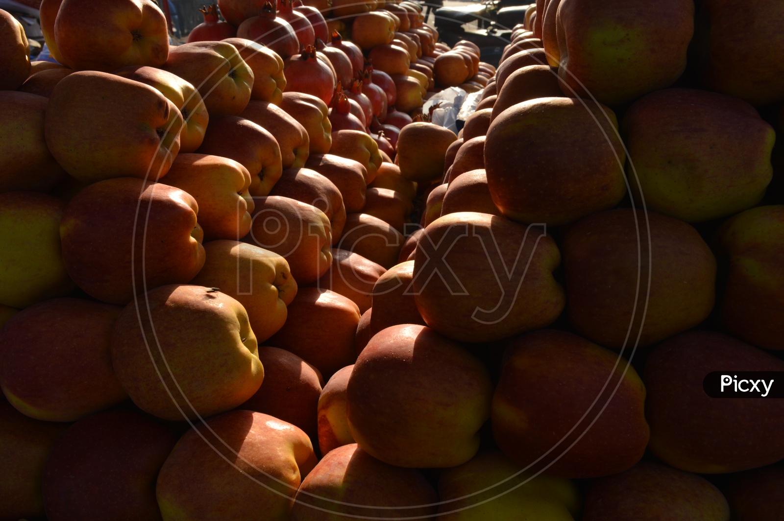 Apples Arranged in a manner in a Vendor Stall