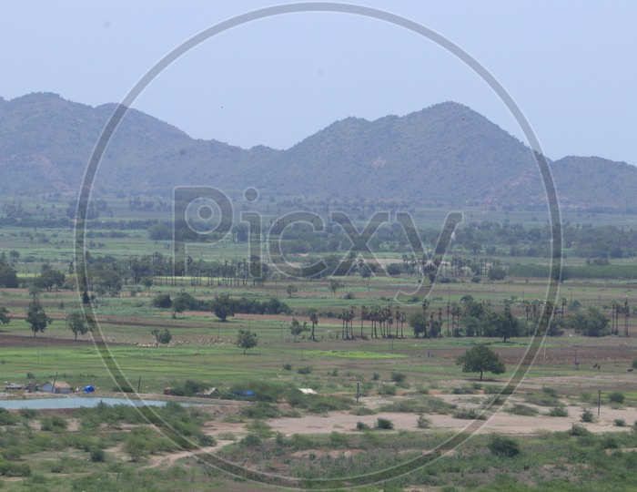 Landscapes of Vijayawada - mountains, lake and green land
