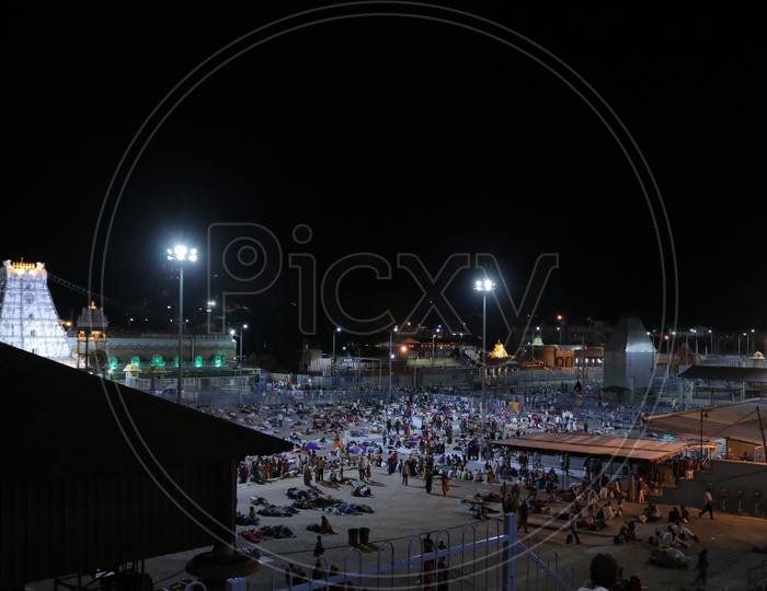Aerial view of the people sleeping outside the temple during the night