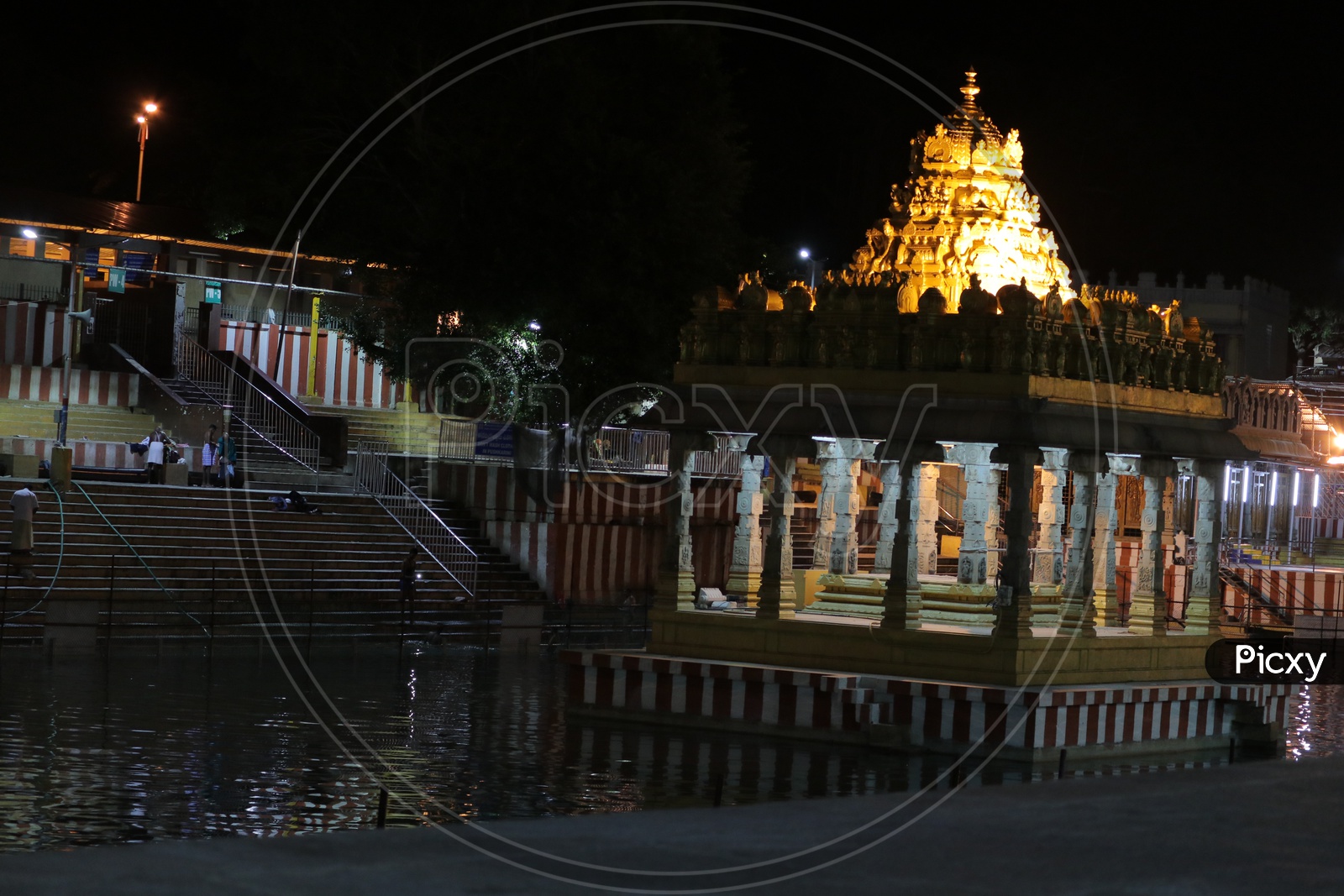 Temple in the water during night