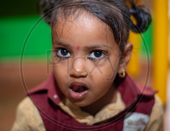 Portrait of a young girl in an Anganwadi center