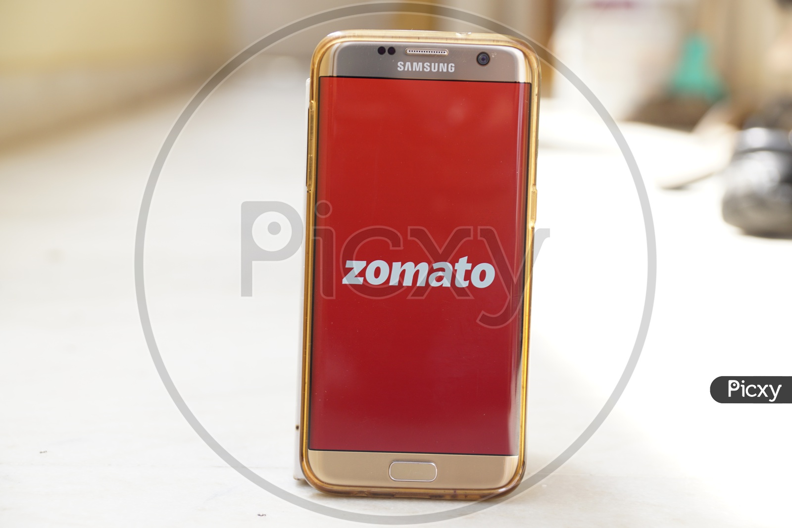 Smartphone with Zomato Application on Screen