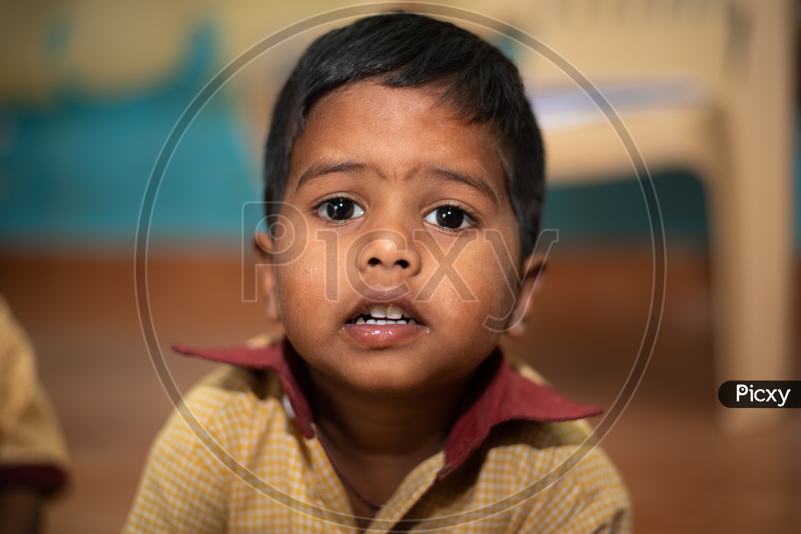 Portrait of a young boy in an Anganwadi center