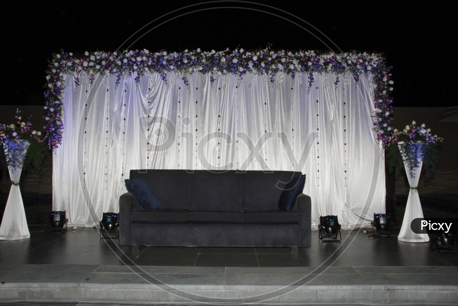 Sofa on a stage