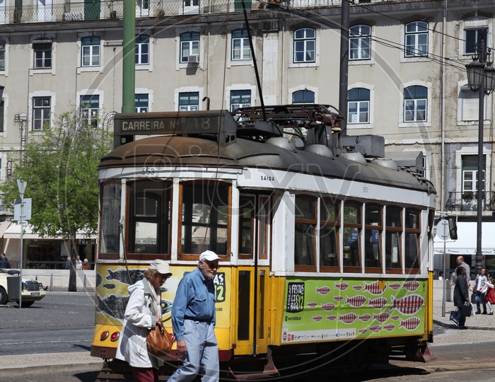 Moving Tram on the road in Lisbon