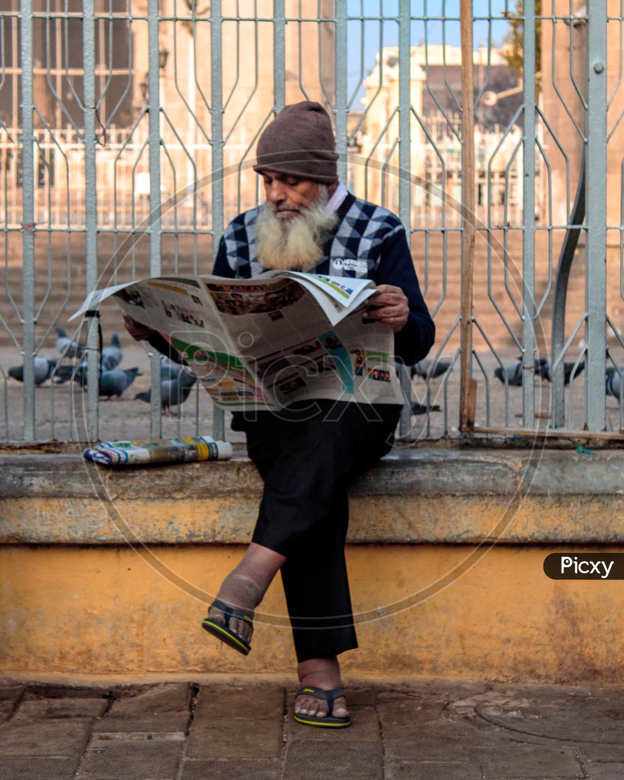 a person reading news paper
