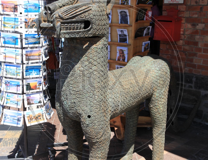 Metal carving of a dog