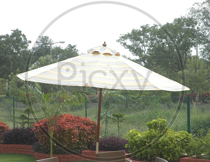 Garden Table With An Umbrella