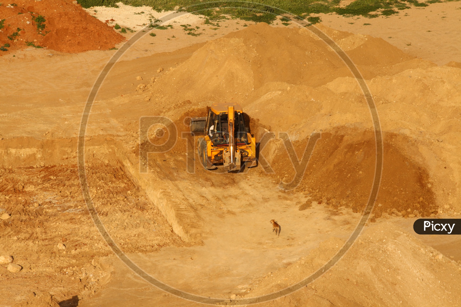 Earth Movers Working on a hill top