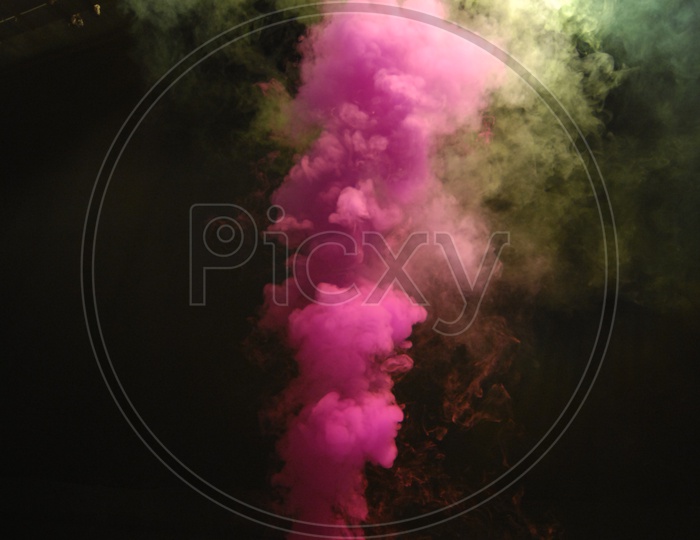 Colourful smoke bomb emitting smoke
