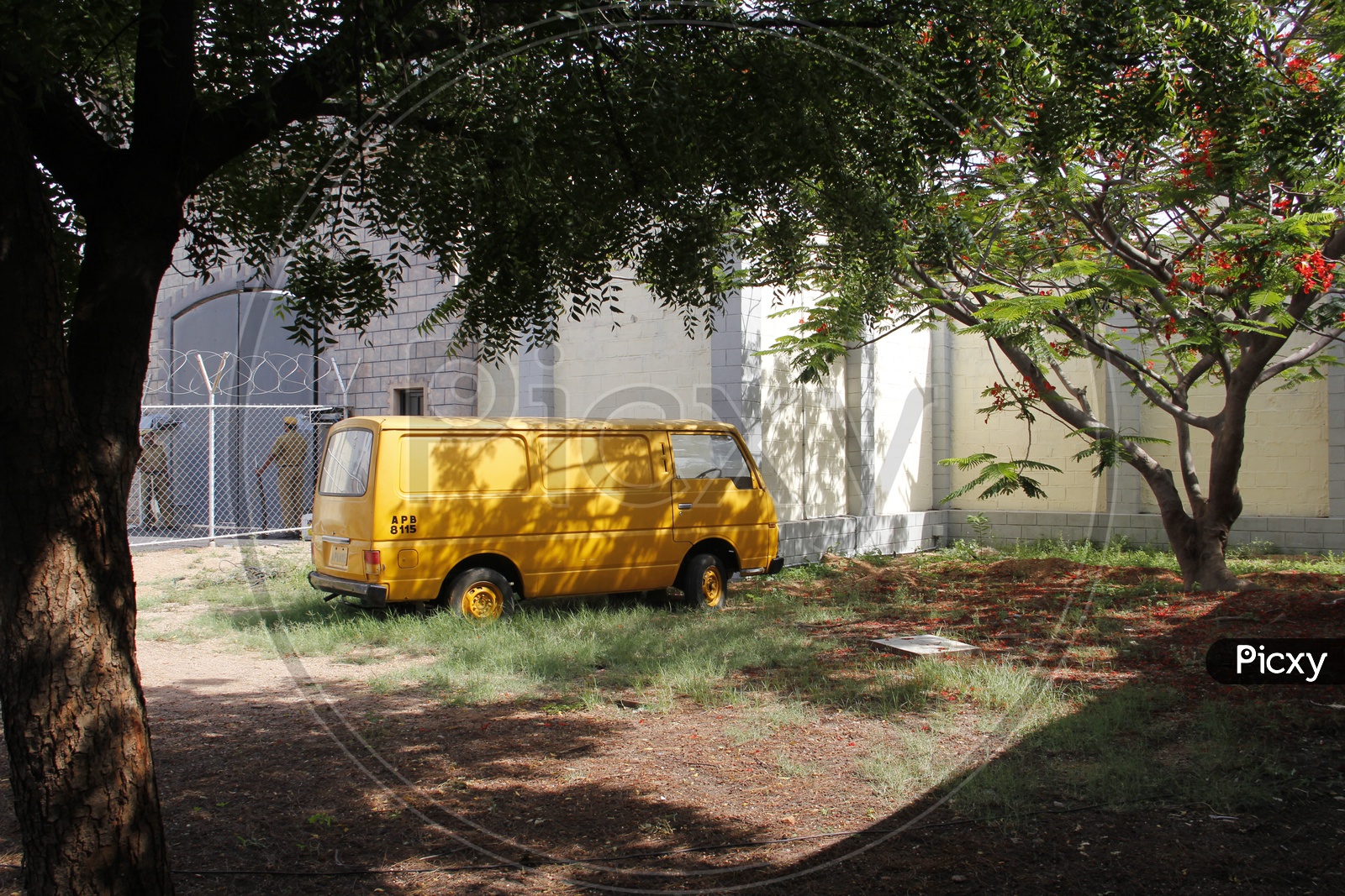 Yellow van near a Jail