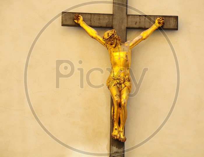 Jesus crucification staute on the wall
