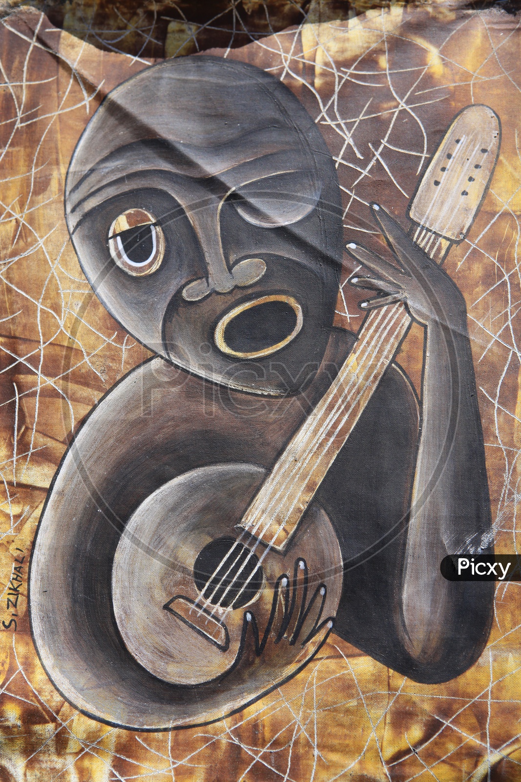 A Wall art of a kid playing guitar