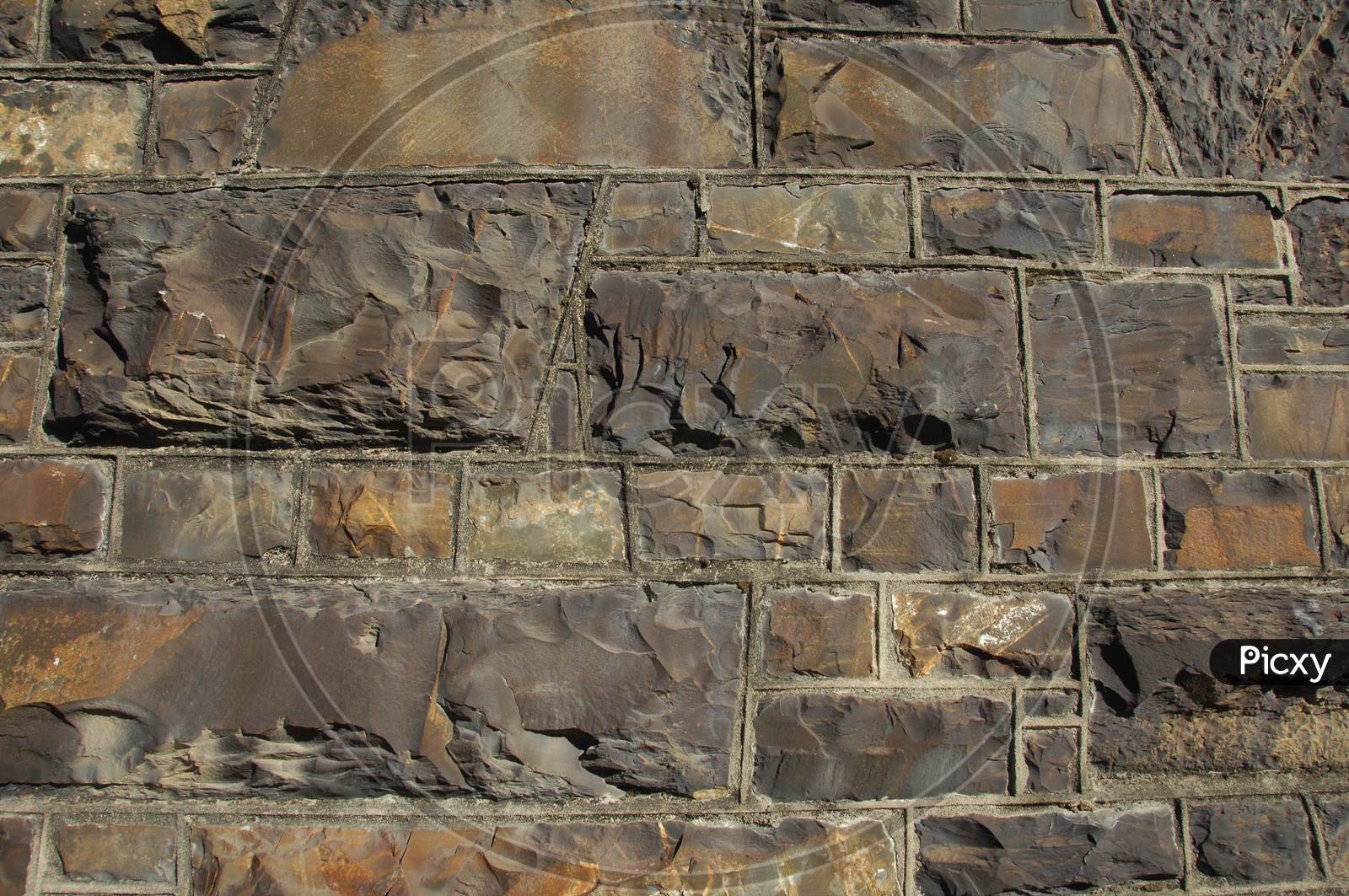Close shot of wall built with rocks