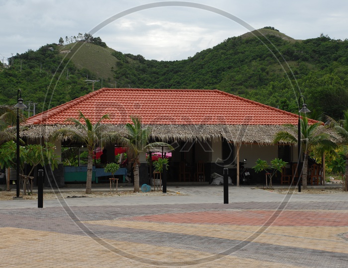 View of hotel alongside a hill