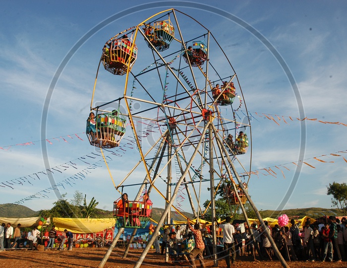 Men rotating the Giant Wheel