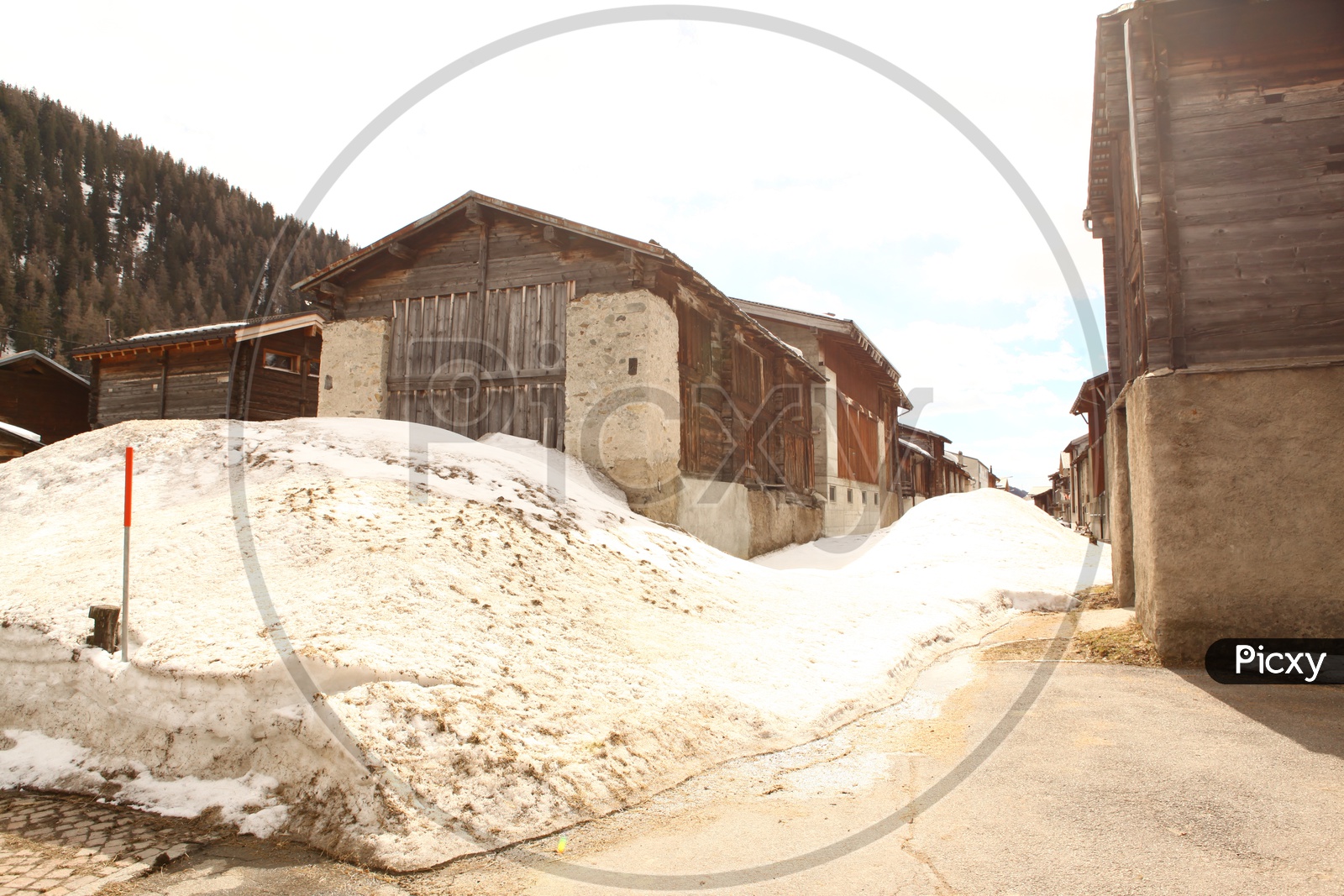 Image of Log cabins with Swiss Alps in the background-HC142149-Picxy
