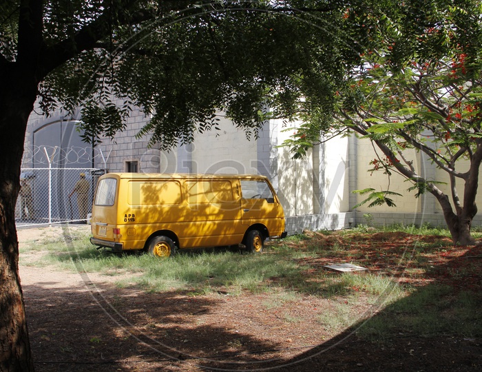 Yellow van near a Jail