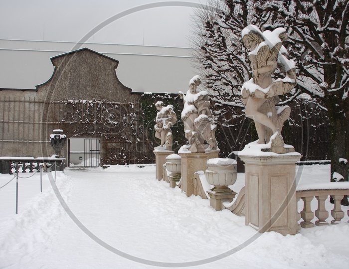 Statues covered with snow