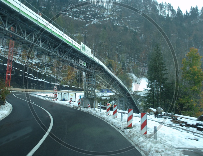 View of road curve through the Alpines