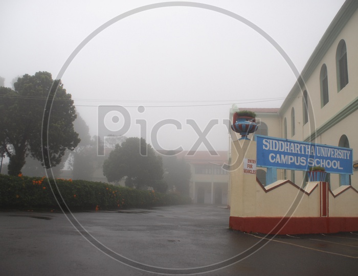 Siddhartha University Campus School covered in fog