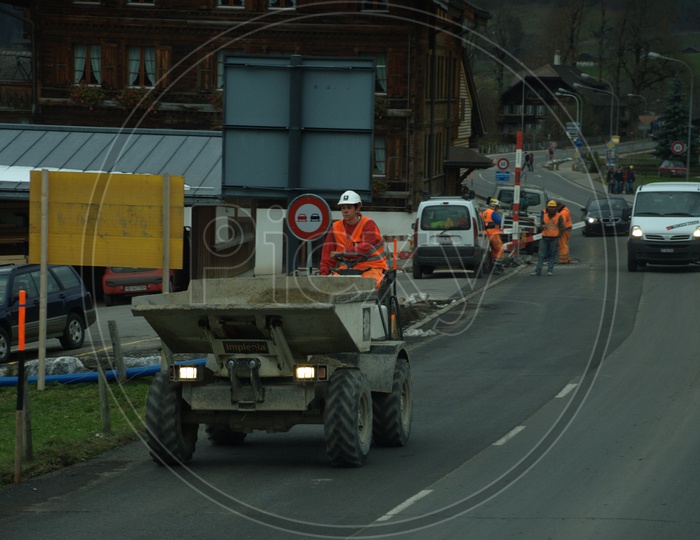 Workers at road work