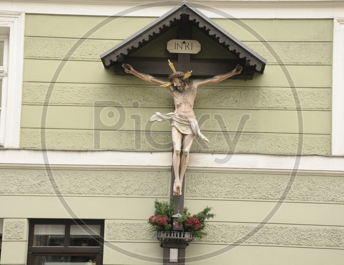 Jesus crucification statue on the wall