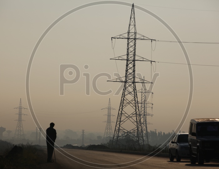 Silhouette of a man on road