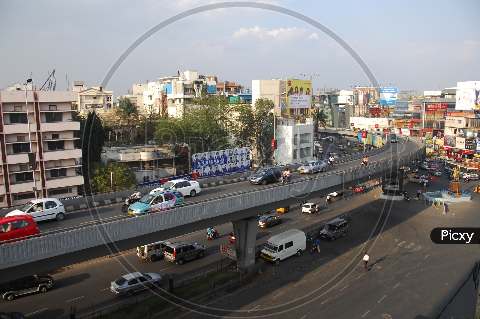 vehicles moving on Nagarjuna circle fly over and on the road