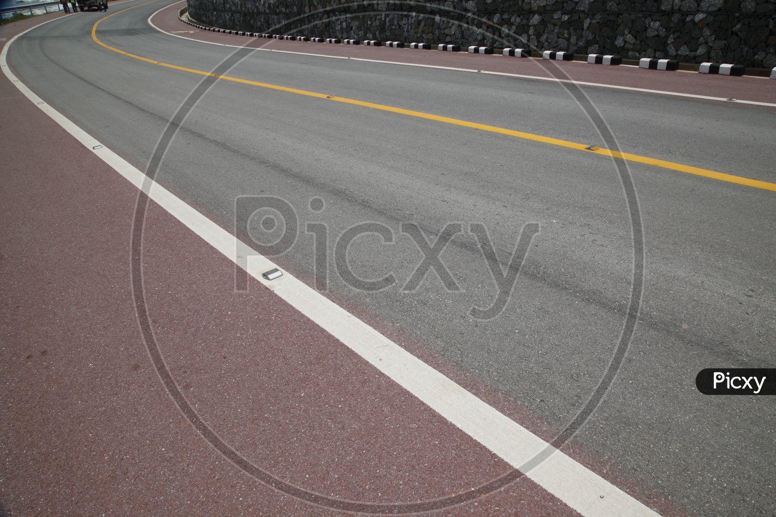 Road surface markings and pavement markers